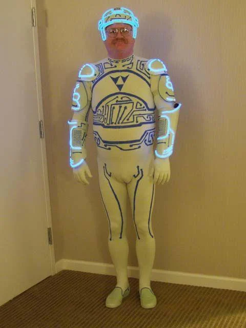 Jay Maynard standing in full glowing Tron Guy costume