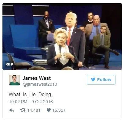 Trump Lurking Behind Clinton — Twitter screenshot with GIF of Trump shadowing Clinton across debate stage.