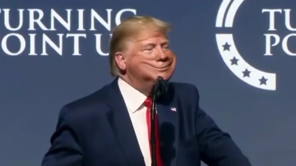 Documentary-style photograph of Trump speaking at Turning Point USA event at podium with signage visible.