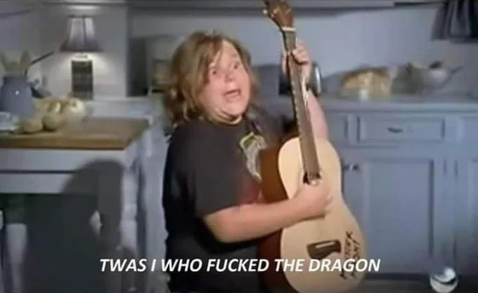 Twas I Who Fucked The Dragon — Screenshot from Kickapoo music video with yellow subtitle.