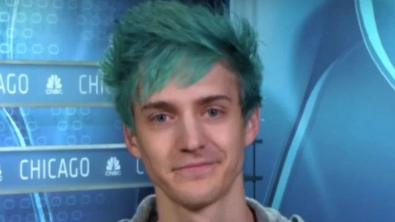 Tyler Ninja Blevins with teal hair during a CNBC Chicago television interview