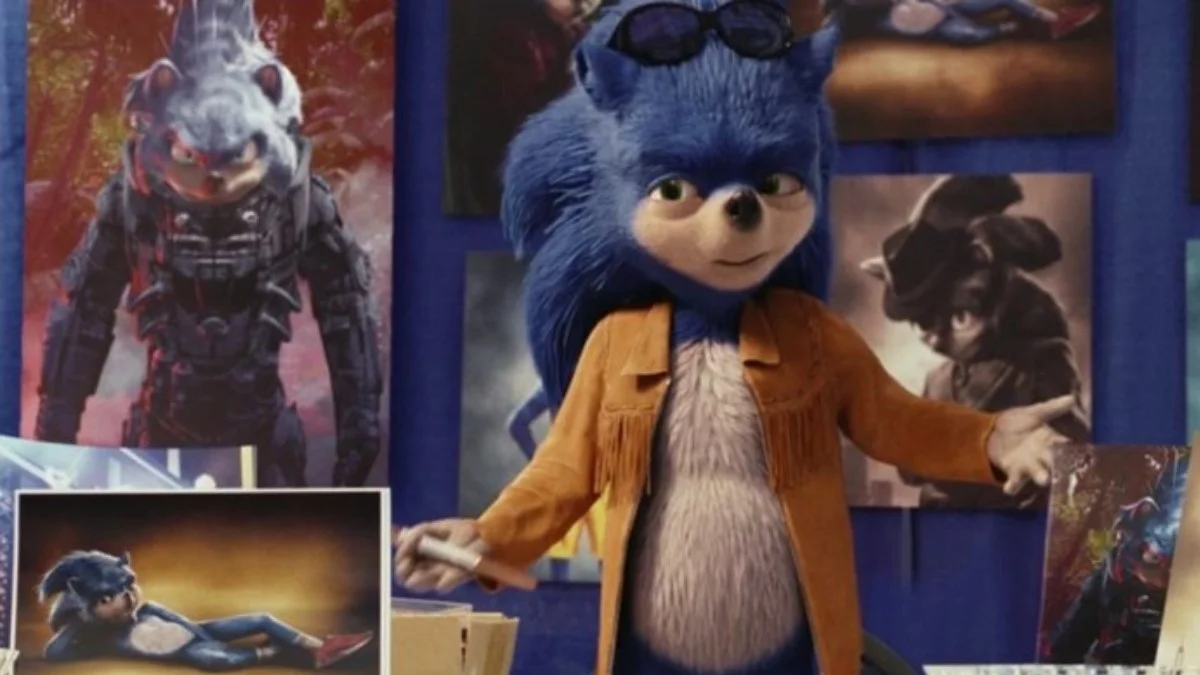 Ugly Sonic — Original live-action Sonic the Hedgehog with human teeth and small eyes wearing an orange jacket surrounded by promotional artwork