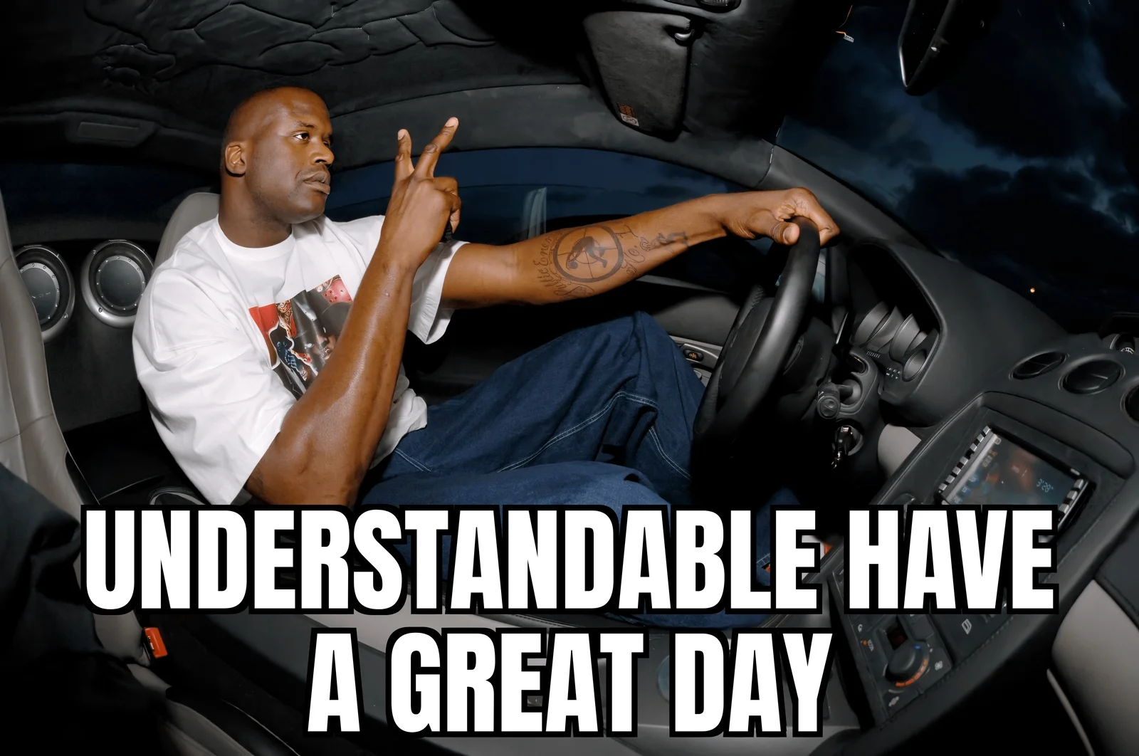 Understandable Have a Great Day — Original unfiltered photograph of a man in a white shirt sitting in a car giving a two-finger salute with overlay text.