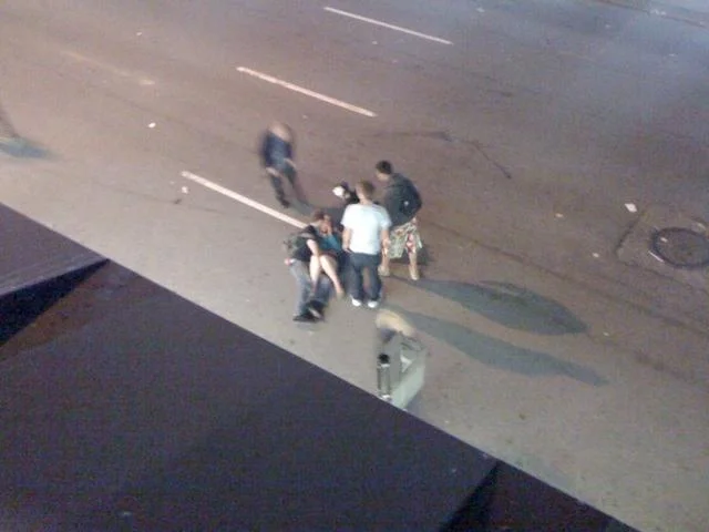 Vancouver Riot Kiss — Grainy overhead photograph from riot event at night.