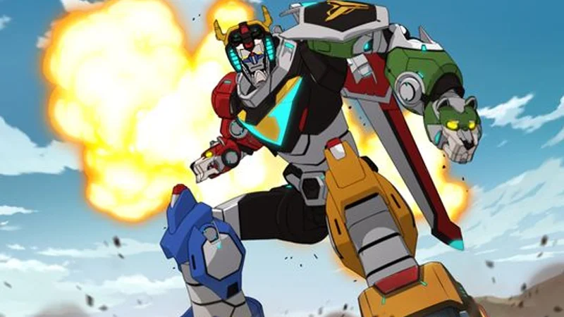 Voltron: Legendary Defender — Voltron giant robot formed from five lions standing in front of an explosion