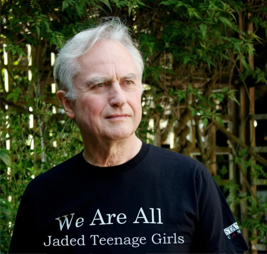 We Are All Africans — Dawkins photo with shirt reading 'We Are All Jaded Teenage Girls'.