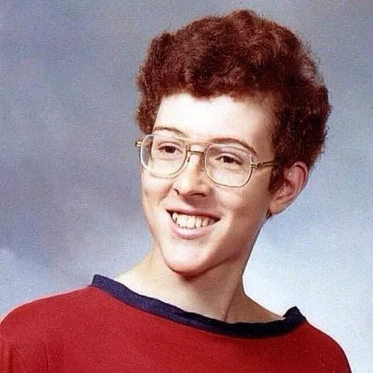 "Weird Al" Yankovic — Young Weird Al Yankovic as a teenager in a school portrait with glasses and red shirt
