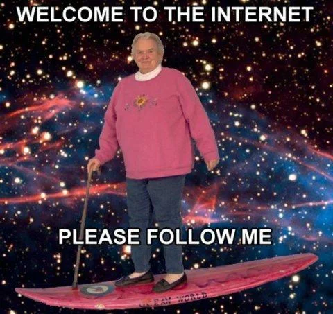 Welcome To The Internet — Elderly woman surfing through space nebula.