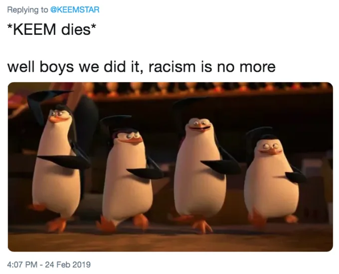 Well Boys, We Did It. Racism Is No More — Twitter screenshot replying to KEEMSTAR with the penguins racism meme