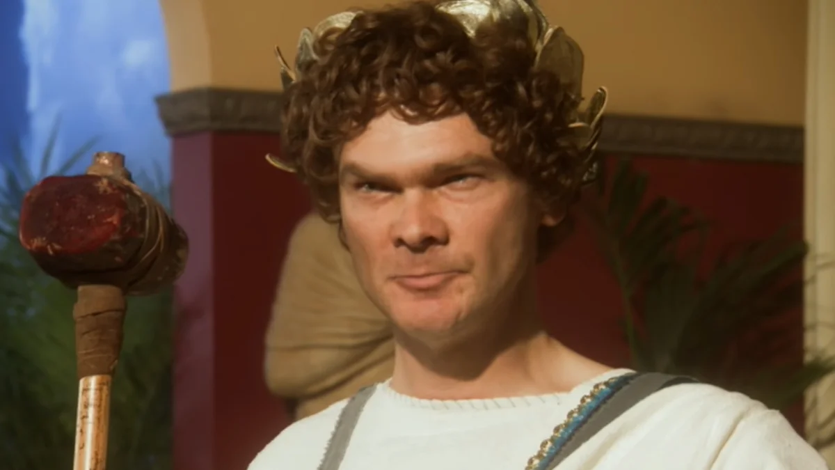 What Do You Think Wackus Bonkus? — Young Roman emperor with curly hair and golden laurel wreath smirking in a palace setting