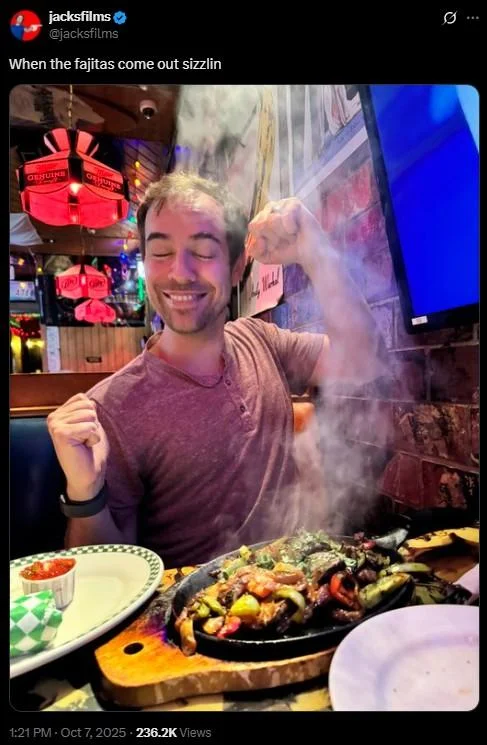 When The Fajitas Come Out Sizzling — ProJared in black suit looking attentive, captioned about hearing sizzling fajitas