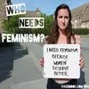 Who Needs Feminism — Reduced or cropped street scene image showing what appears to be people in public activism setting.