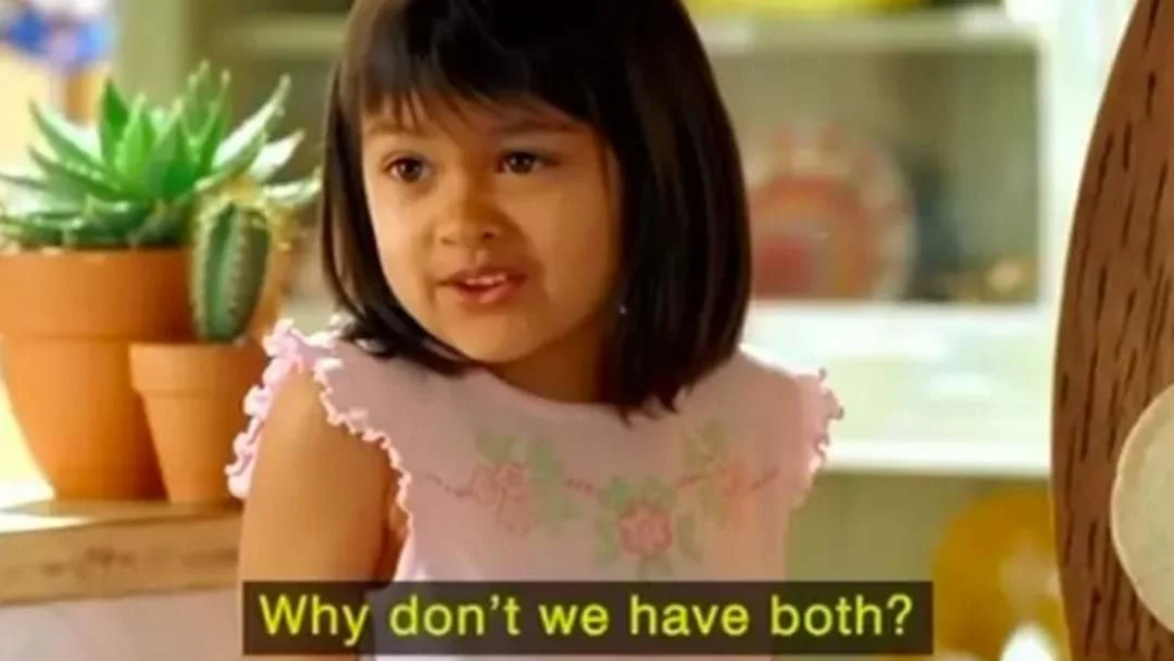 Why Not Both? — Young girl in pink dress with subtitle reading 'Why don't we have both?' from Old El Paso commercial