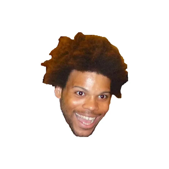 WideHardo — Cutout headshot of a smiling man with an afro on a white background