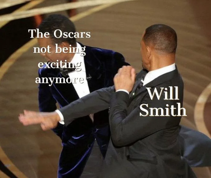 Unedited photograph from 2022 Oscars capturing Will Smith slapping Chris Rock in motion on stage.