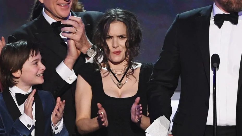 Winona Ryder's SAG Award Reaction — Winona Ryder makes a bewildered face while clapping on stage alongside her Stranger Things castmates at the SAG Awards.
