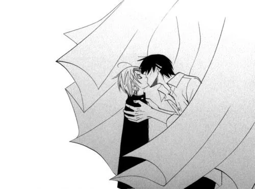 Yaoi Hands — Black-and-white manga page depicting two male characters kissing while embracing.