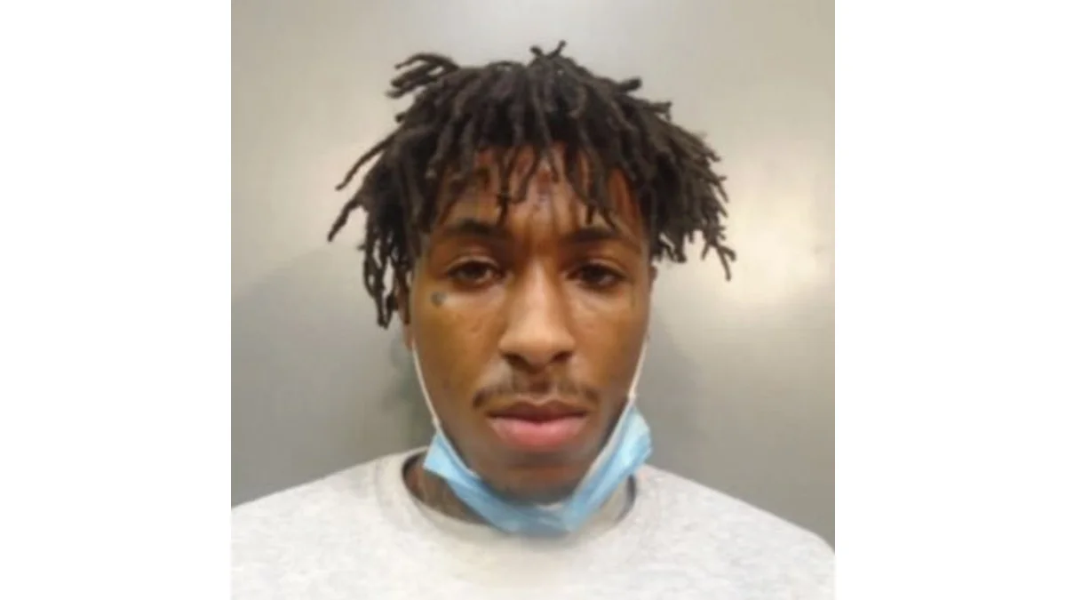 Yb Better — NBA YoungBoy mugshot photo with surgical mask pulled down