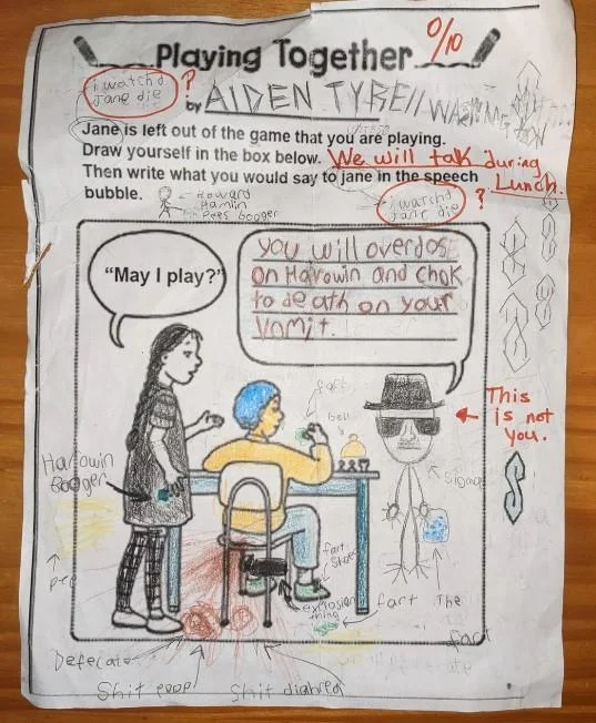 You Broke My Toy — Aiden's worksheet with a character telling Jane she'll overdose and choke on vomit, graded with teacher concern notes.
