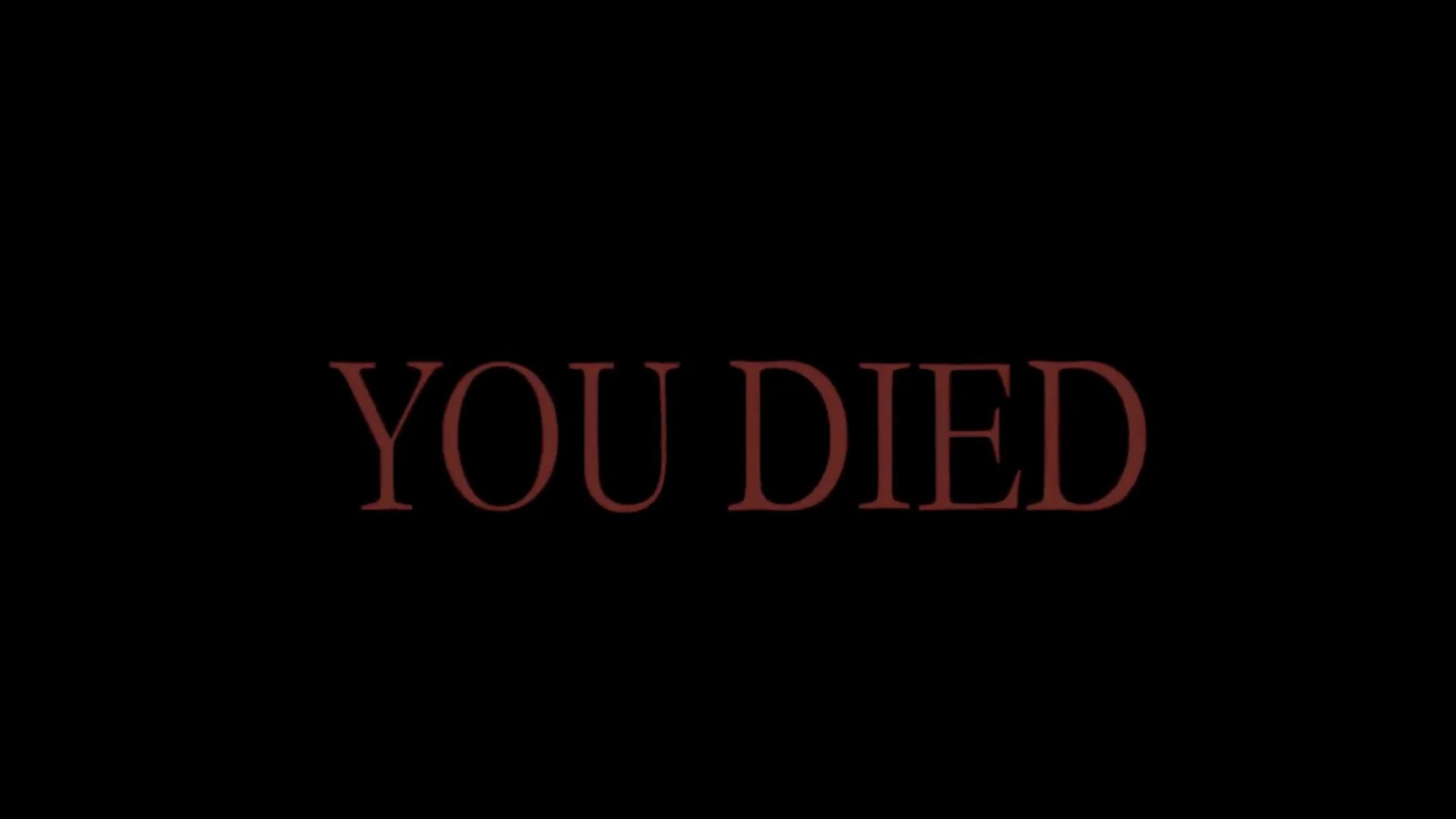 Dark Souls death screen with red 'YOU DIED' text on a black background.