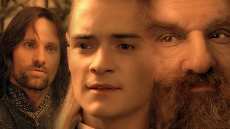 You Have My Sword And My Bow And My Axe — Clean screenshot from Lord of the Rings showing Legolas, Aragorn, and Gimli characters.