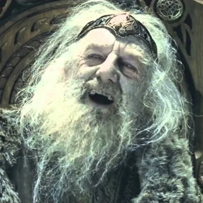 You Have No Power Here! — Close-up of possessed King Theoden with long white hair and beard laughing on his throne