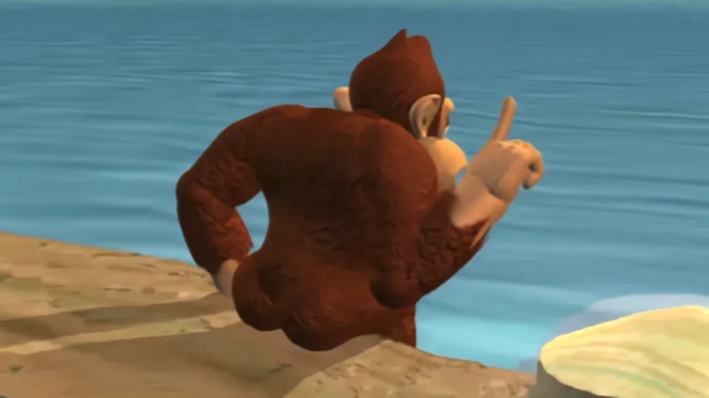 You May Spank It, Once — Donkey Kong from behind on a rocky shore wagging his finger over his shoulder