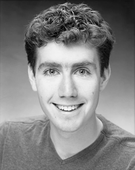 You On Kazoo — Black-and-white adult headshot of Brett Ambler, the Kazoo Kid actor