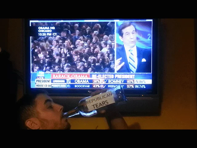 Your Tears are Delicious — Man drinking from a 'Republican Tears' bottle while TV shows Obama re-election