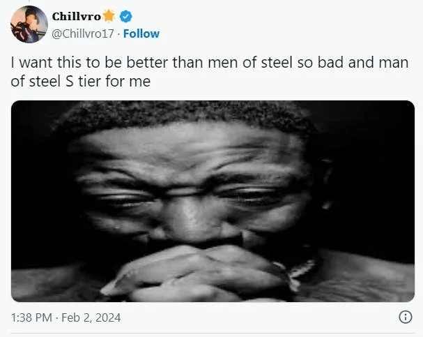 Twitter screenshot by @Chillvro17 using the Yung Joc crying praying image as a reaction to Superman film discourse.
