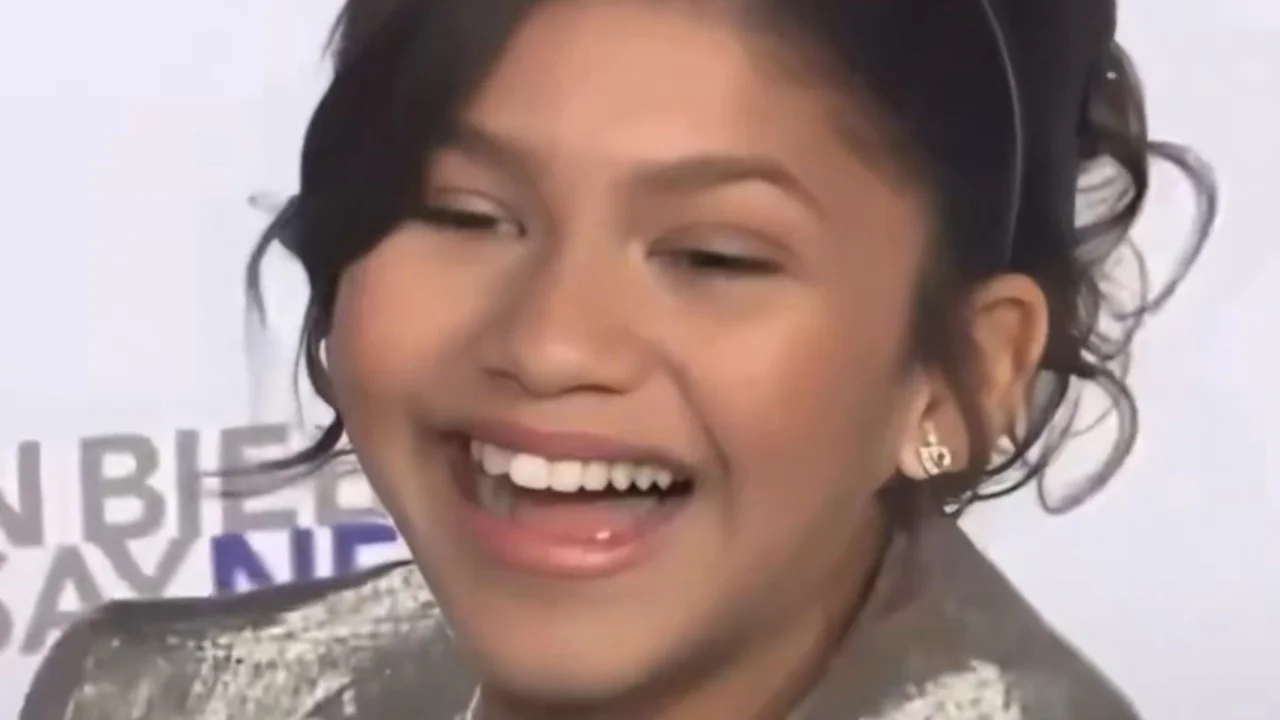 Zendaya Laughing at "Never Say Never" Premiere — Young Zendaya laughing with her mouth open on the Never Say Never premiere red carpet
